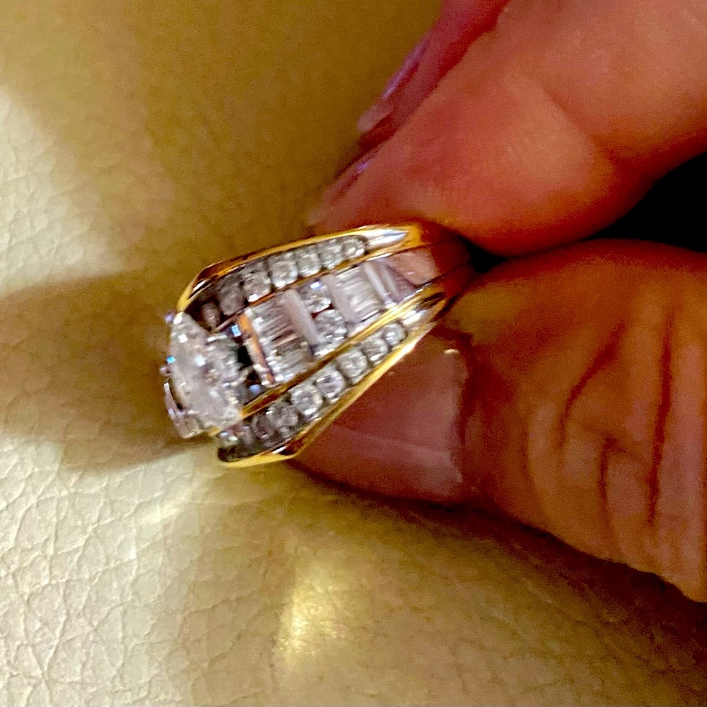 1/3ct Single solitaire diamond with .90 encased diamonds on both sides
